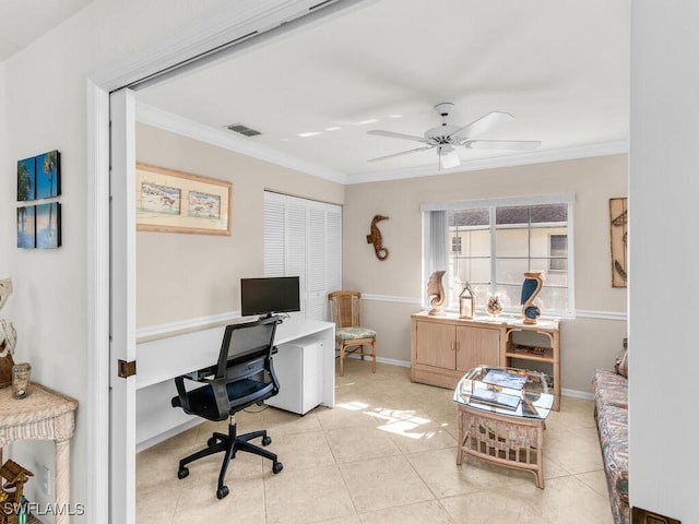 office area with ceiling fan, ornamental molding, and light tile patterned flooring