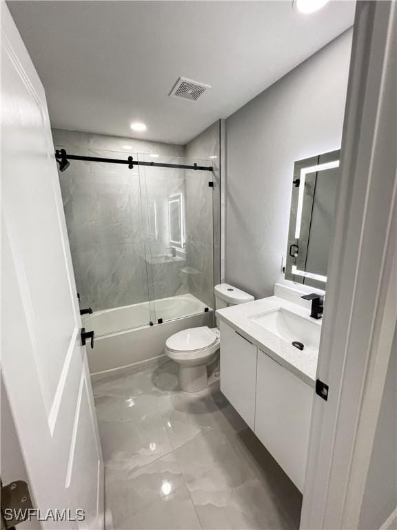 full bathroom featuring vanity, toilet, and enclosed tub / shower combo