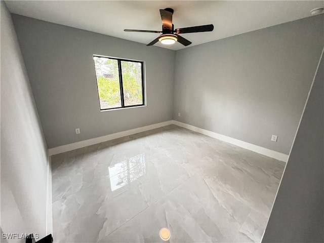 empty room featuring ceiling fan