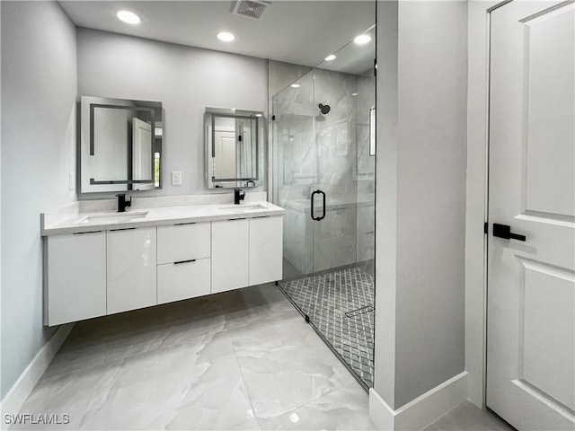 bathroom with vanity and walk in shower