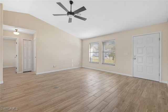 unfurnished living room featuring light wood-type flooring, ceiling fan, and lofted ceiling