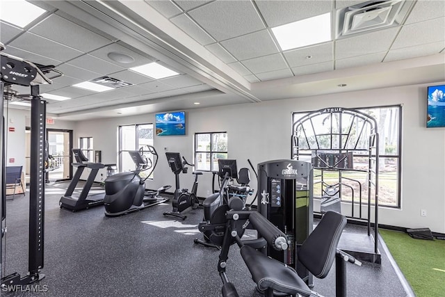 gym featuring a drop ceiling