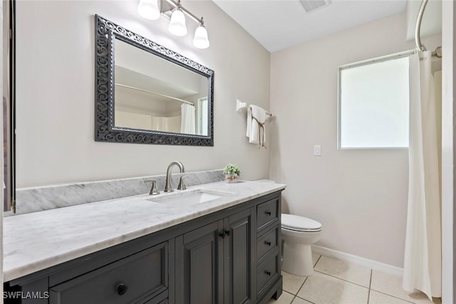 bathroom with tile patterned flooring, vanity, curtained shower, and toilet