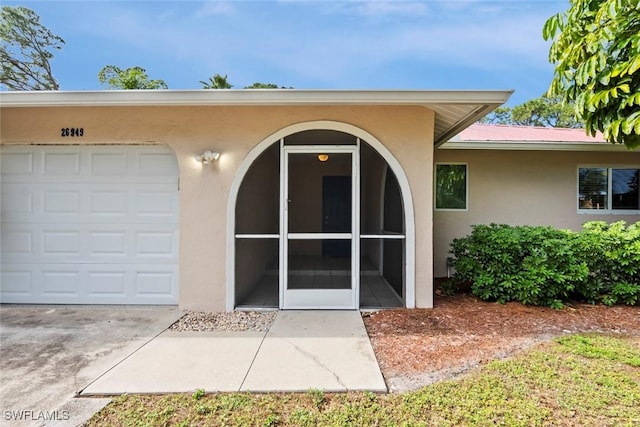 property entrance featuring a garage