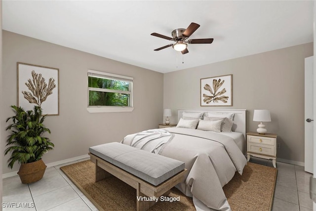 tiled bedroom with ceiling fan