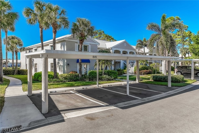 view of car parking with a carport