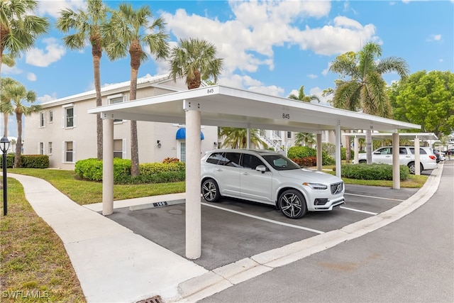 view of parking with a carport