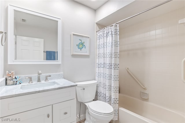 full bathroom featuring shower / bath combination with curtain, vanity, and toilet