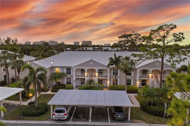 view of outdoor building at dusk