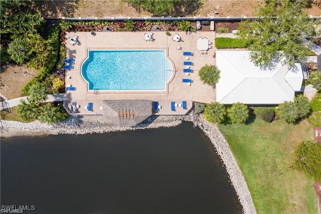 birds eye view of property featuring a water view