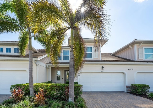 view of front of property with a garage