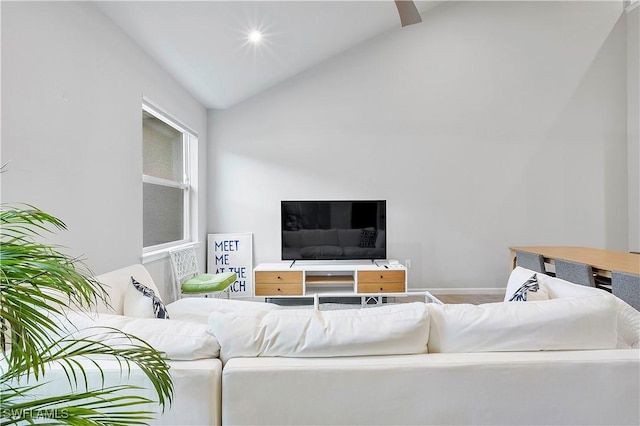 living room with vaulted ceiling