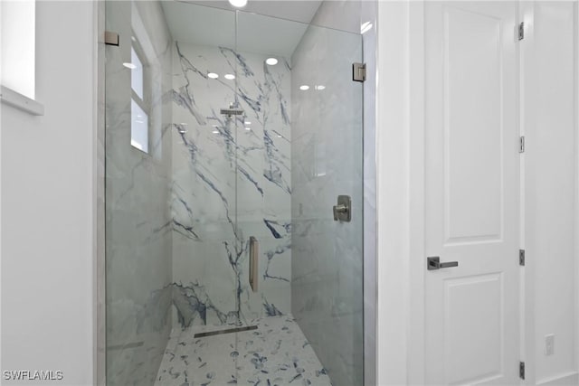 bathroom featuring an enclosed shower