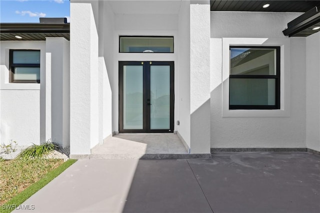 doorway to property with french doors