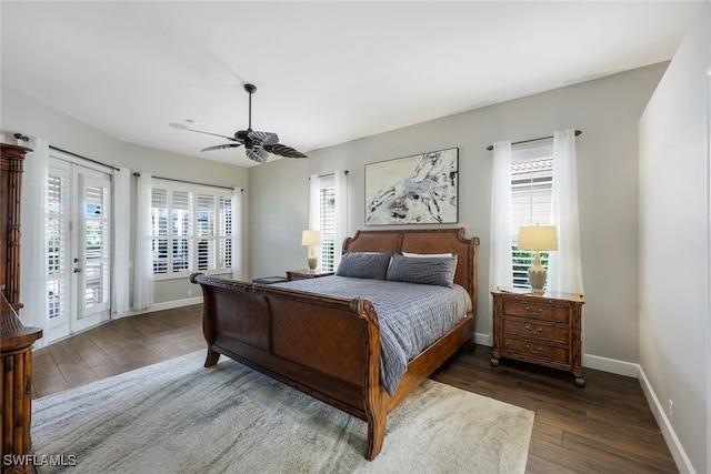 bedroom featuring ceiling fan, dark hardwood / wood-style flooring, access to outside, and french doors