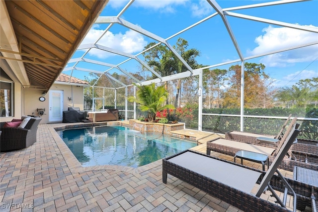 view of pool featuring area for grilling, a lanai, a patio, and a hot tub