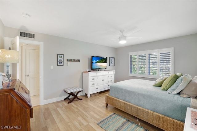 bedroom featuring ceiling fan and light wood-type flooring