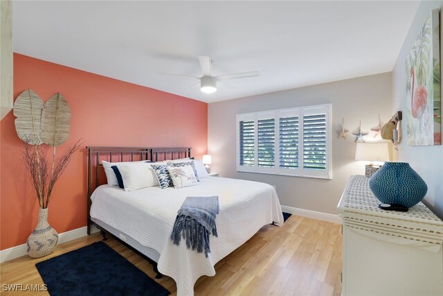 bedroom featuring ceiling fan and light hardwood / wood-style flooring