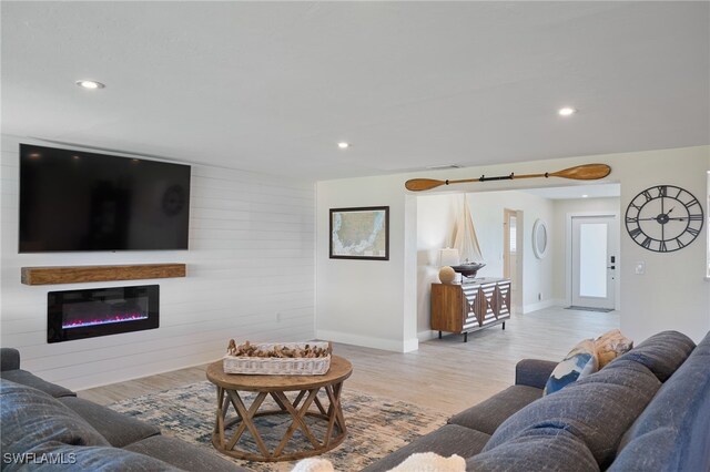 living room with light hardwood / wood-style floors