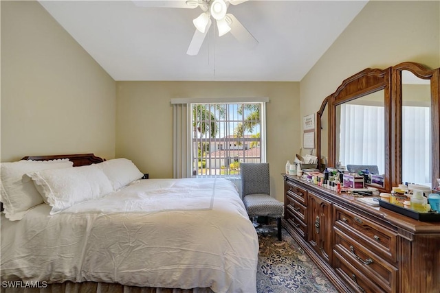 bedroom featuring ceiling fan and vaulted ceiling