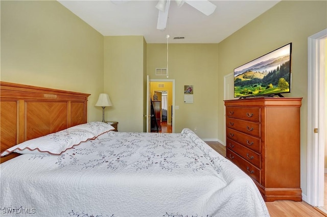 bedroom featuring ceiling fan and light wood-type flooring