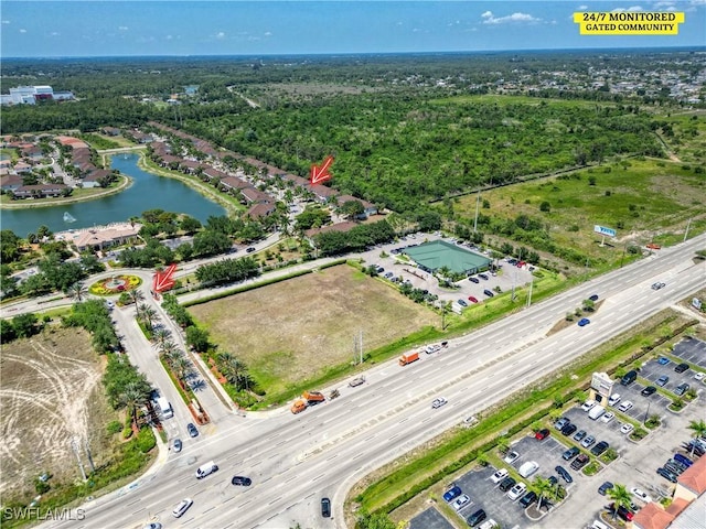 drone / aerial view with a water view