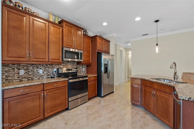 kitchen featuring pendant lighting, crown molding, sink, decorative backsplash, and stainless steel appliances