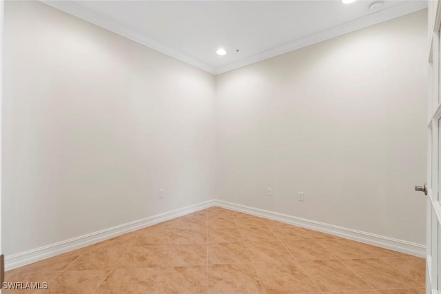 tiled empty room with crown molding