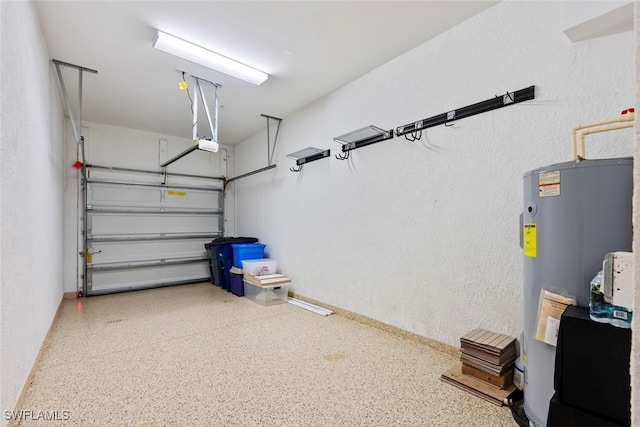 garage featuring electric water heater and a garage door opener