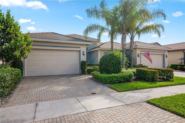 single story home with a garage