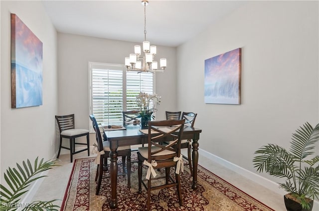 dining area featuring a chandelier