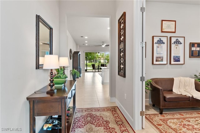 hallway with light tile patterned flooring