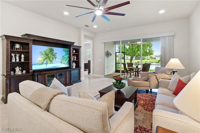 living room featuring ceiling fan