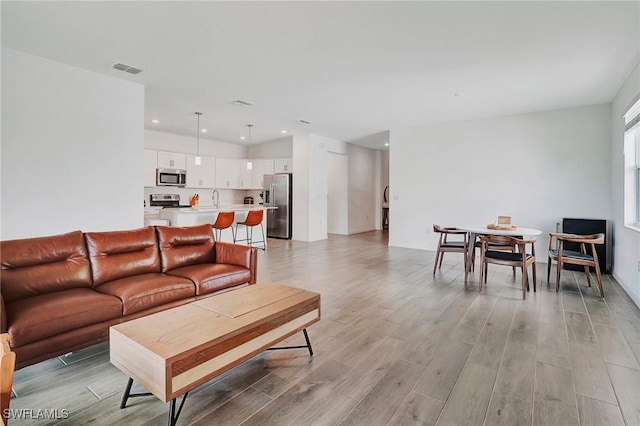 living room with sink