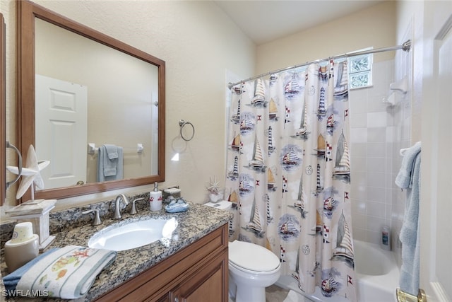 full bathroom with vanity, shower / bath combination with curtain, and toilet