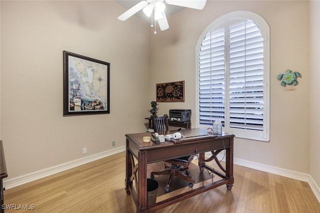 office space with ceiling fan and light wood-type flooring