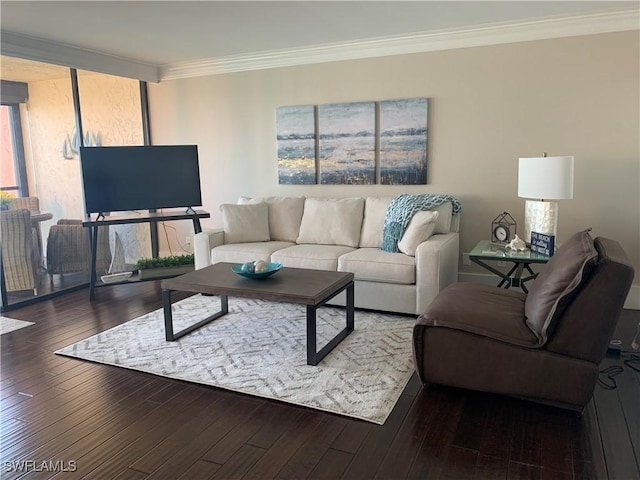 living room featuring crown molding and hardwood / wood-style floors