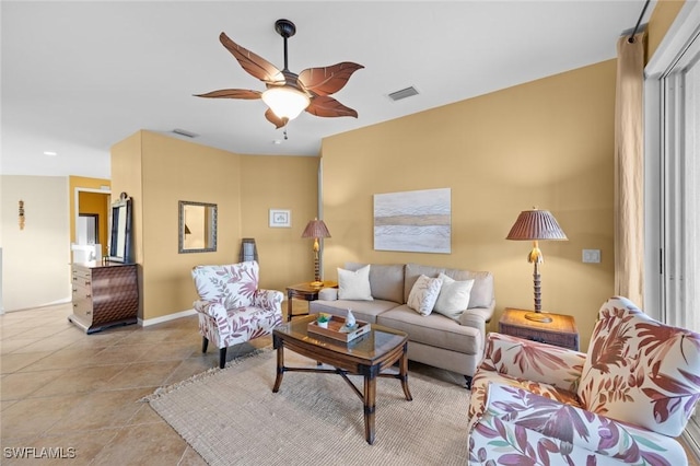 living room featuring ceiling fan