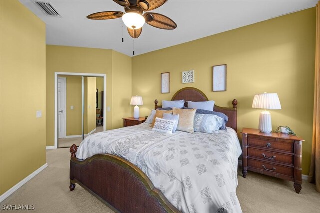 carpeted bedroom with ceiling fan