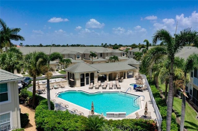 view of swimming pool with a patio area