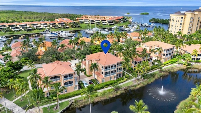 bird's eye view with a water view