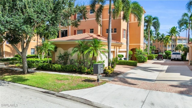 view of property featuring a garage