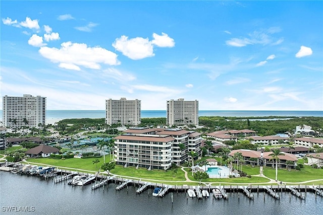 birds eye view of property featuring a water view