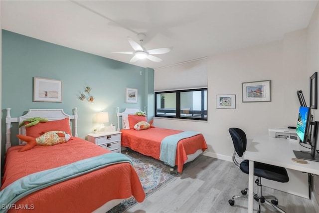 bedroom with ceiling fan and light wood-type flooring