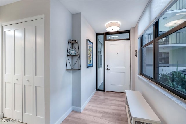 doorway to outside featuring light hardwood / wood-style flooring