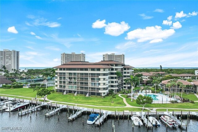 view of building exterior with a water view