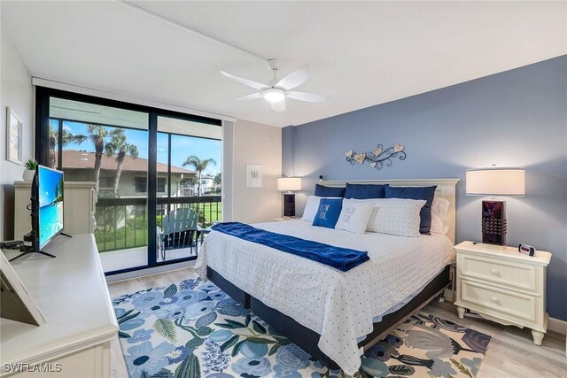 bedroom with ceiling fan, floor to ceiling windows, light wood-type flooring, and access to outside