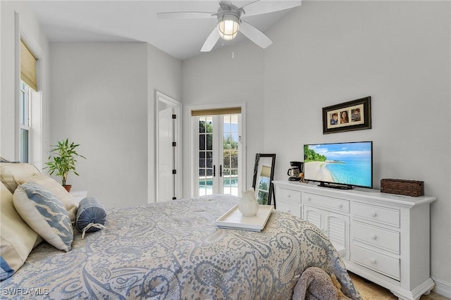 bedroom featuring access to outside, ceiling fan, and french doors