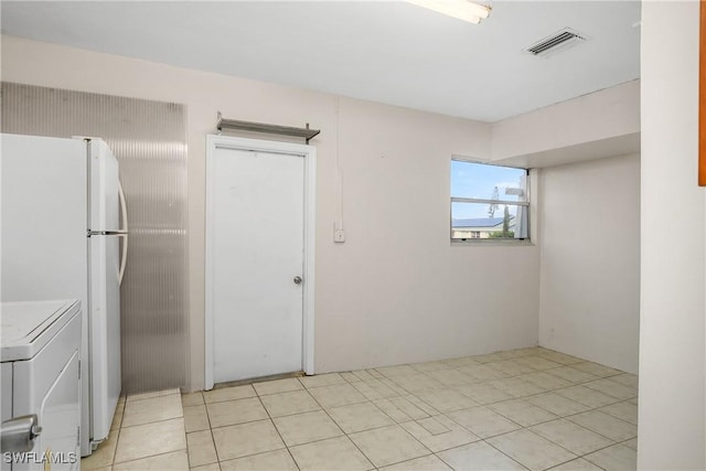 interior space with washer / clothes dryer