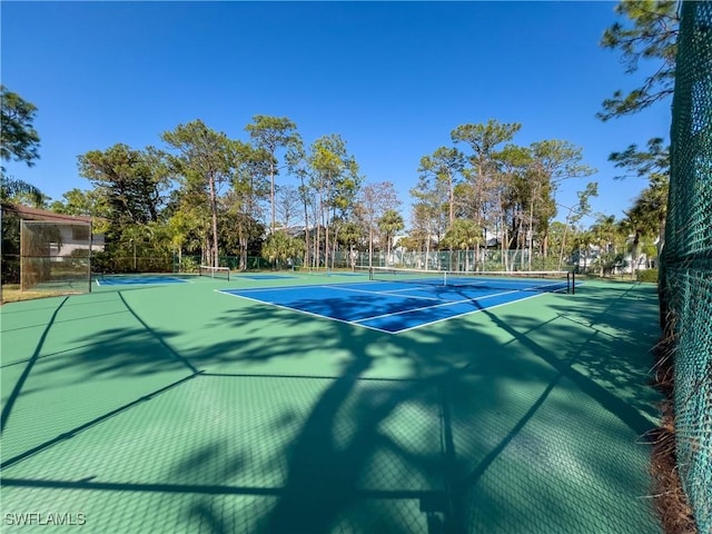 view of tennis court with basketball court